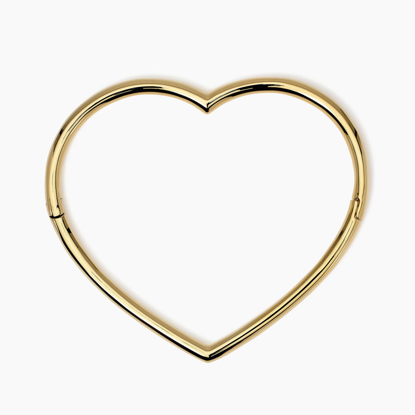 Bracciale rigido a cuore in acciaio dorato