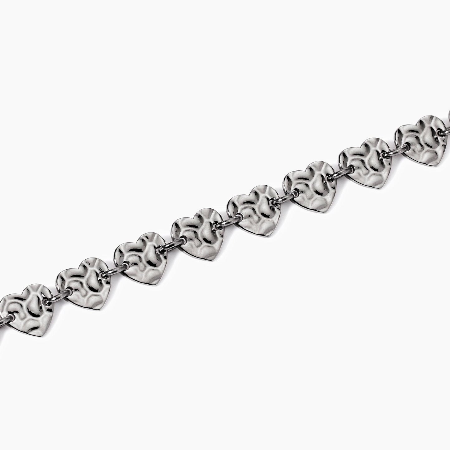 Bracciale cuori con effetto martellato in acciaio argentato